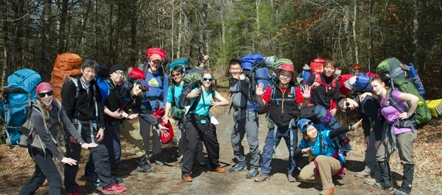 Students with backpacks on RU Outdoors trip