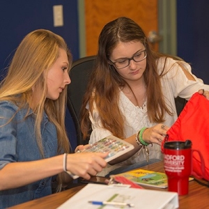 Students from Waldron College of Health and Human Services work on drawstring bags for needy children as part of the SPROUT Program in the New River Valley.