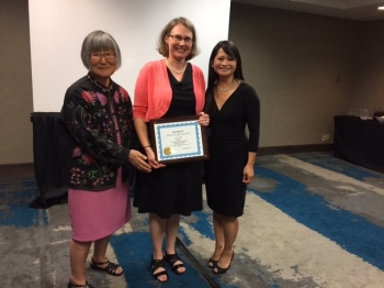Radford University Assistant Professor of Chemistry Amy Balija (center) received the Centennial Award for Excellence in Undergraduate Teaching at the Iota Sigma Pi Triennial Convention in Indianapolis, Indiana