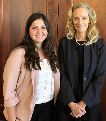 Erin Dimino, a senior biology major and the latest recipient of the Boyd Forensic and Anthropological Sciences Scholarship, is joined by mentor and benefactor Professor Donna Boyd. 