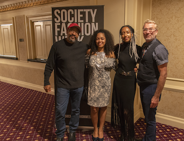 Farrel Doss, left, Destiny Howard, second to left, and John Jacob, right, after Howard's collection was displayed at Society Fashion Week.