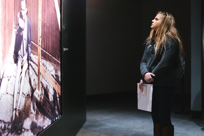 Sarah Derrick examines an exhibit at the United States Holocaust Memorial Museum