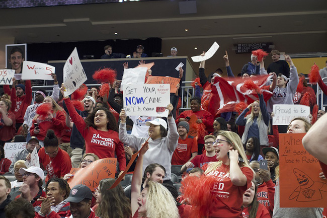 Radford University students cheer on the Men's basketball team during a final four game