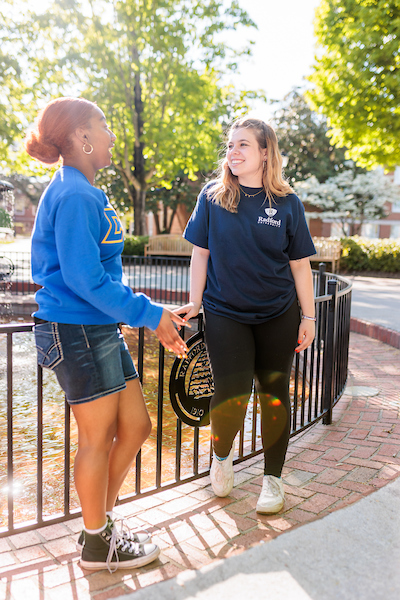 students at fountain on main campus