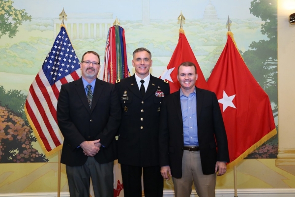 New US Army Brigadier General Jay Bienlien (Radford University '90) is flanked by Peter Rasmussen '90 (left) and Arin Durr '94 at his promotion ceremony March 23 at Patton Hall, Fort Meyer, VA. (Photo credit: Marla J. Hurtado)