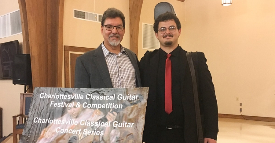 Graduate student Octávio Deluchi (right) stands beside Dr. Robert Trent (left) Octavio was the first prize winner in the Charlottesville Classical Guitar Festival and Competition.