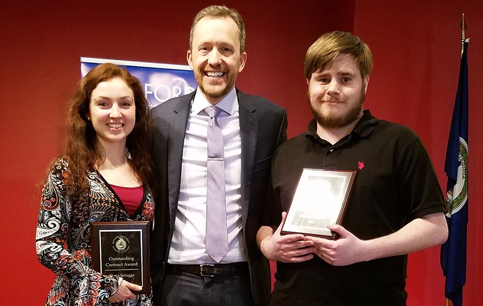 Fiona Scruggs (left) and Matthew Cibak (right) pose with Dr. Niels Christensen (center) as they receive their awards