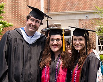 Ross with students at 2016 commencement