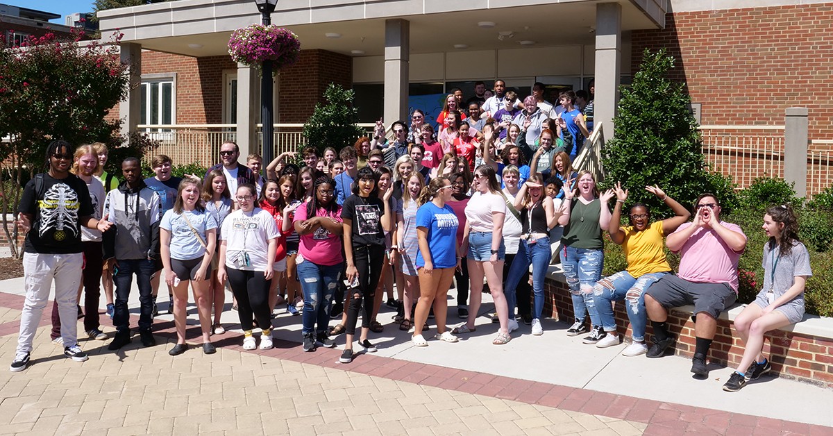 Students in the Community of Artists pose for a group photo in September 2019.