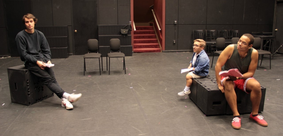 Students pause for a break during an early rehearsal session for "Darkside."