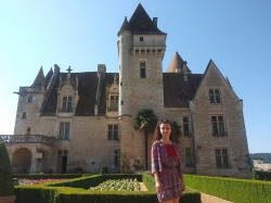 Scruggs poses in front of Josephine Baker's chateau in France
