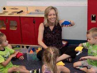 Dr. McDonel works with children at Radford University's Early Learning Center