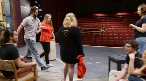 Director Molly Hood works with student cast members to block their movements during a rehearsal of "Wonder of the World."
