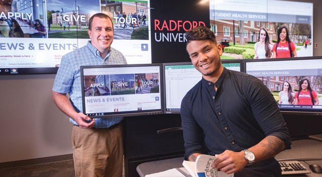Faculty mentor West Bowers, Ph.D., left, associate professor of communication, with Research Rookie Jose Bermude