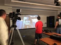 Radford University students and faculty interact with the high-tech simulator