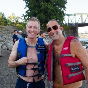 Willie Levenson ’93 with Portland’s mayor, Ted Wheeler, at the Big Float.
