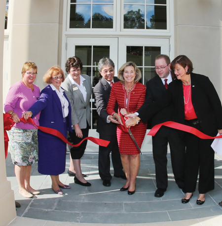 President Kyle and others at the ribbon cutting