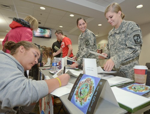 students sending cards to troops
