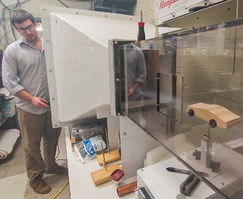 Using the wind tunnel in Curie Hall, Brian Uthe has developed a research project testing the flow dynamics of dimpled car bodies.