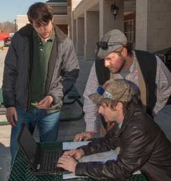 Volunteers monitor GIS Day date collection flow