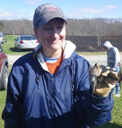 Karen Powers, associate professor of biology and RUTWS chapter adviser, handling a vole. 
