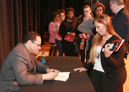 Micheal Eric Dyson signs books