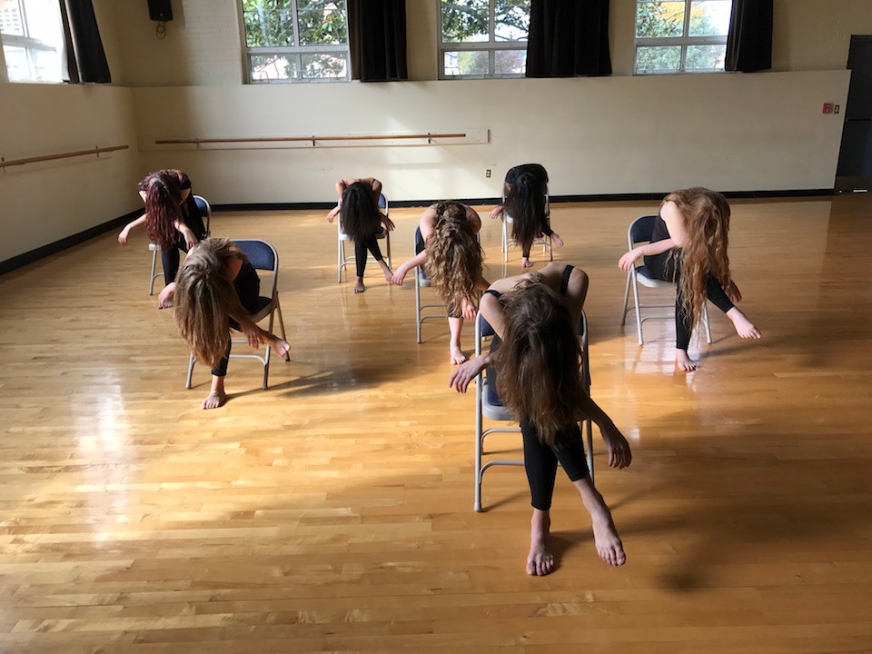 Students rehearsing the dance inspired by the Rosas Remix Project.