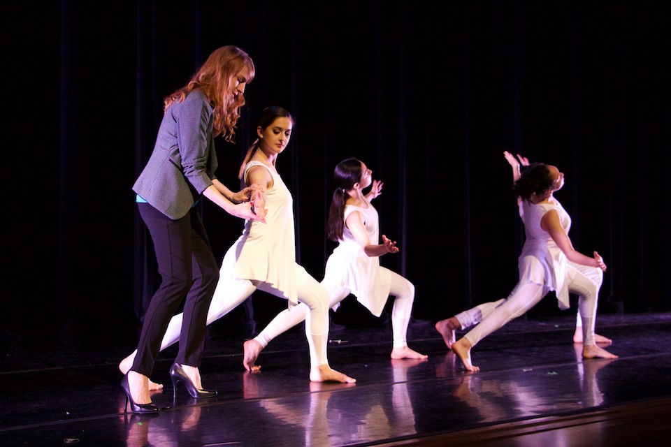 Assistant Professor of Dance Amy VanKirk instructs her dancers during rehearsal.