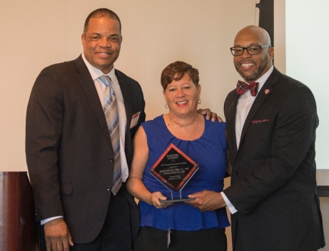 2017 Outstanding Service Award Winners David ’85, M.S. ’87 and Pebbles ’85 Smith with Radford University President Brian O. Hemphill during Friday’s Alumni Volunteer Leadership Business Lunch and Awards Ceremony in Kyle Hall.