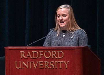 Samantha Chase ’14, now a nurse in UVA’s Medical Center ICU, reflected on her nursing career as guest speaker at the Dec. 14 SON Winter Pinning and Awards Ceremony.