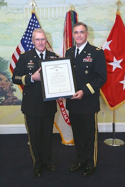 New US Army Brigadier General Jay Bienlien (Radford University '90) receives his promotion order from US Army Lieutenant General Mike Murray on March 23 at Patton Hall, Fort Meyer, VA. (Photo credit: Marla J. Hurtado)