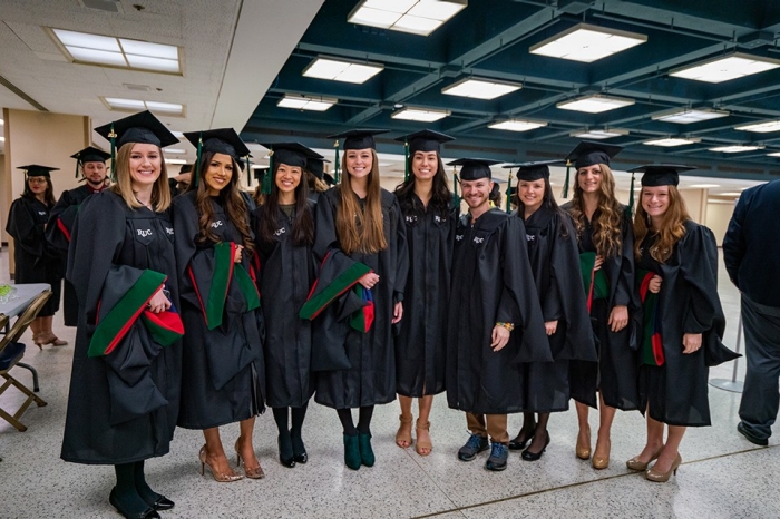 Members of the inaugural RUC class enjoy Winter Commencement.