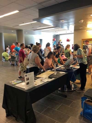 Visitors enjoy activities in the Center for the Sciences during the Apollo 11 celebration on July 20. 