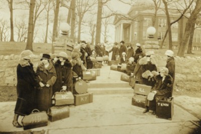 Early Radford University students with suitcases