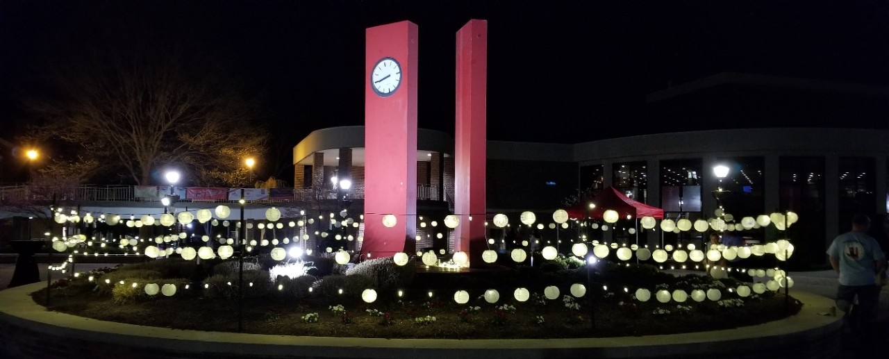 Heth Clocks at night surrounded by glowing paper lanterns