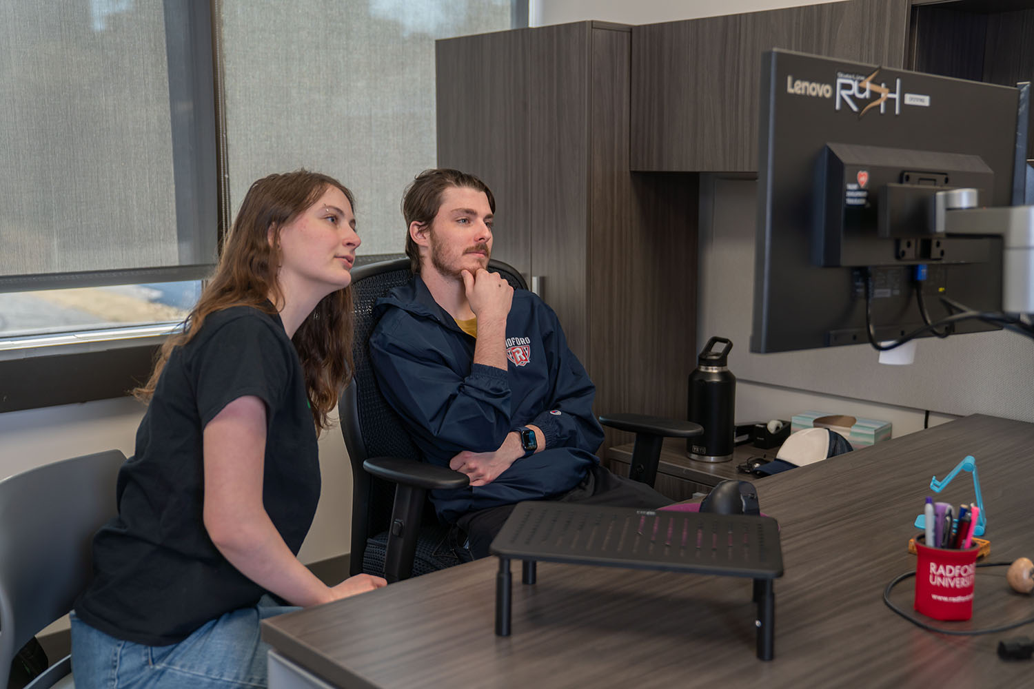 students at computer desk