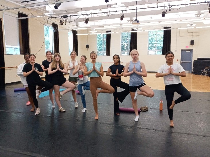 governor's school students participate in a yoga class