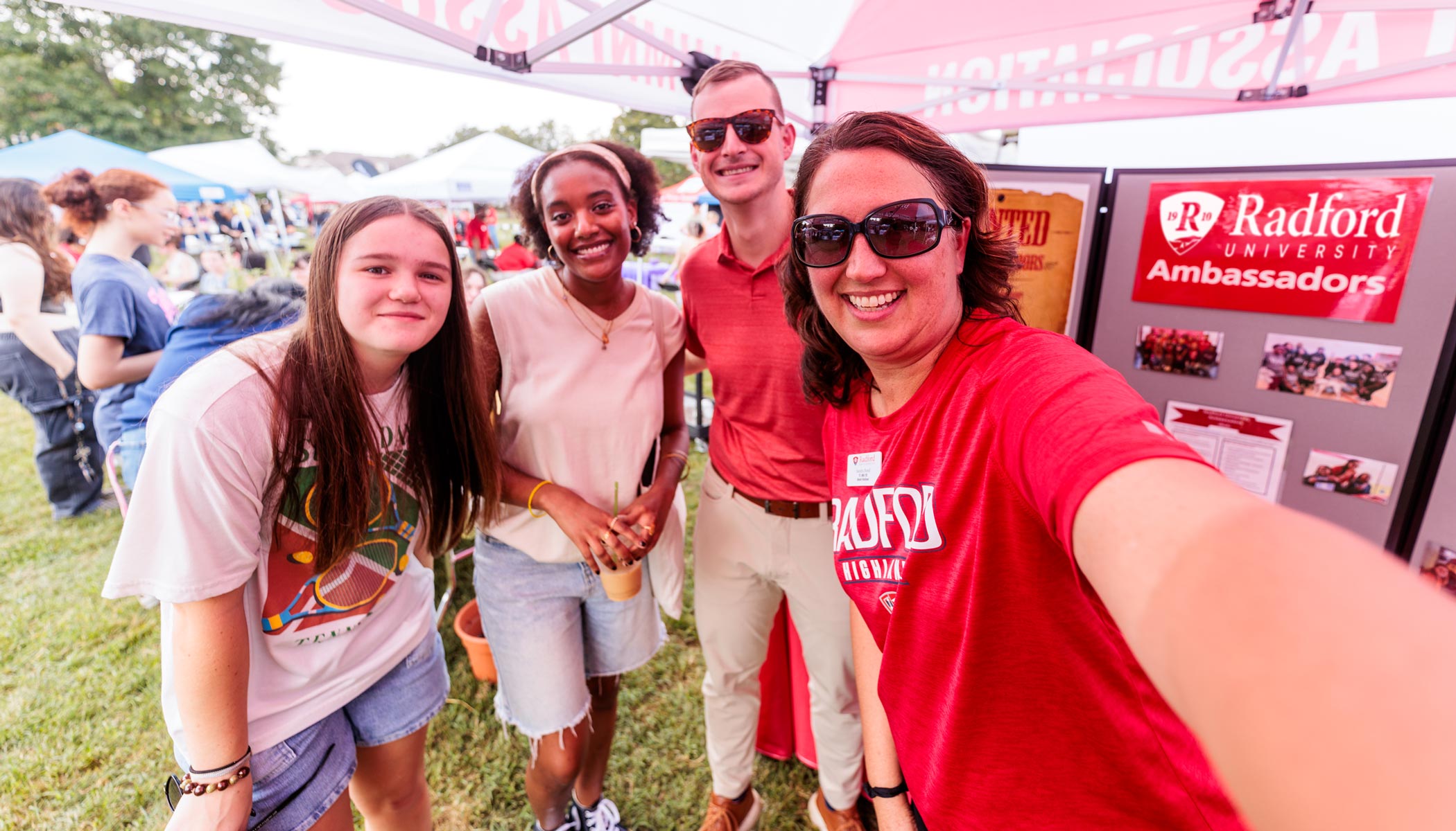 faculty and staff at club fair