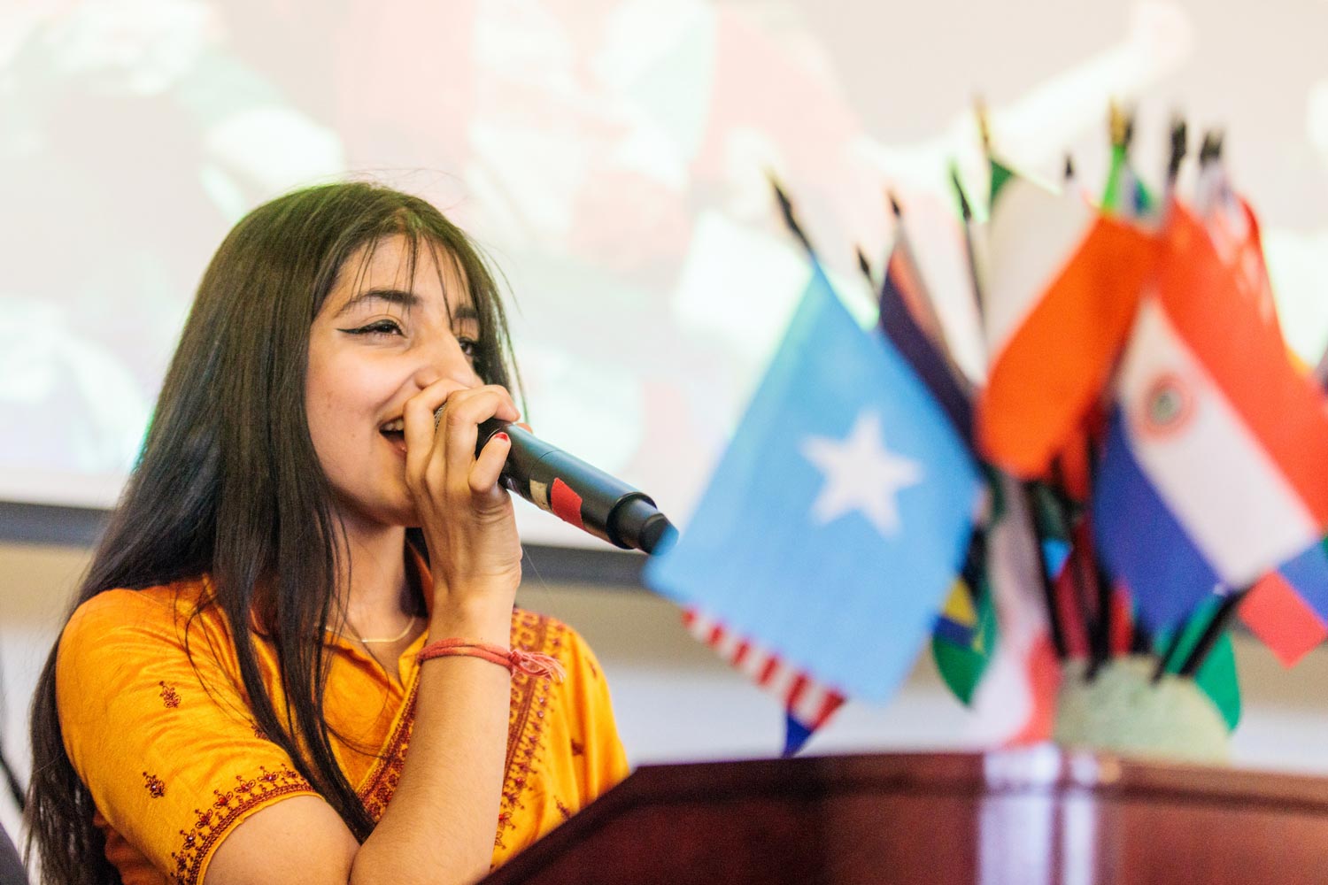 female student with international flags