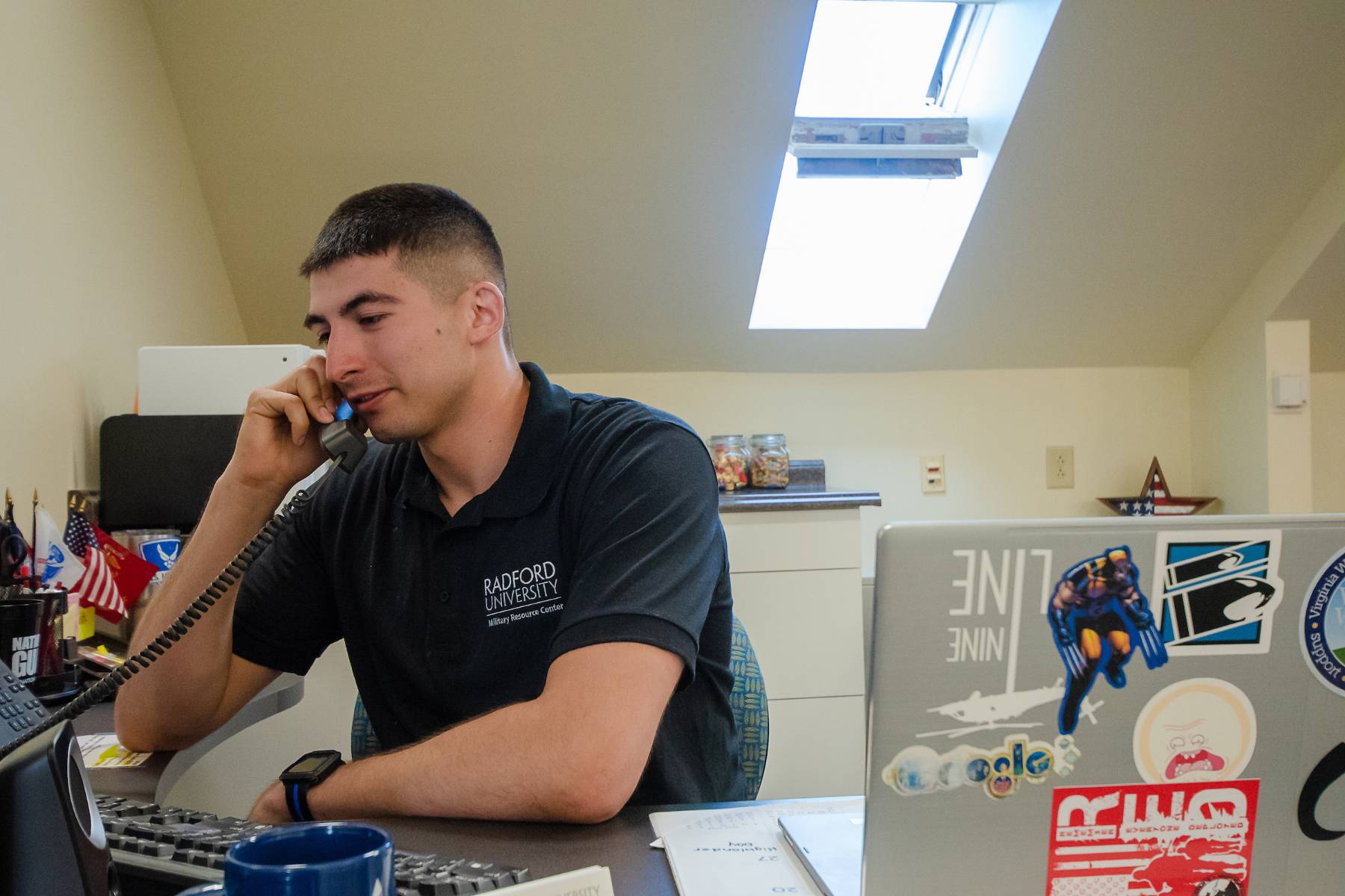 Radford University team member speaking on the phone