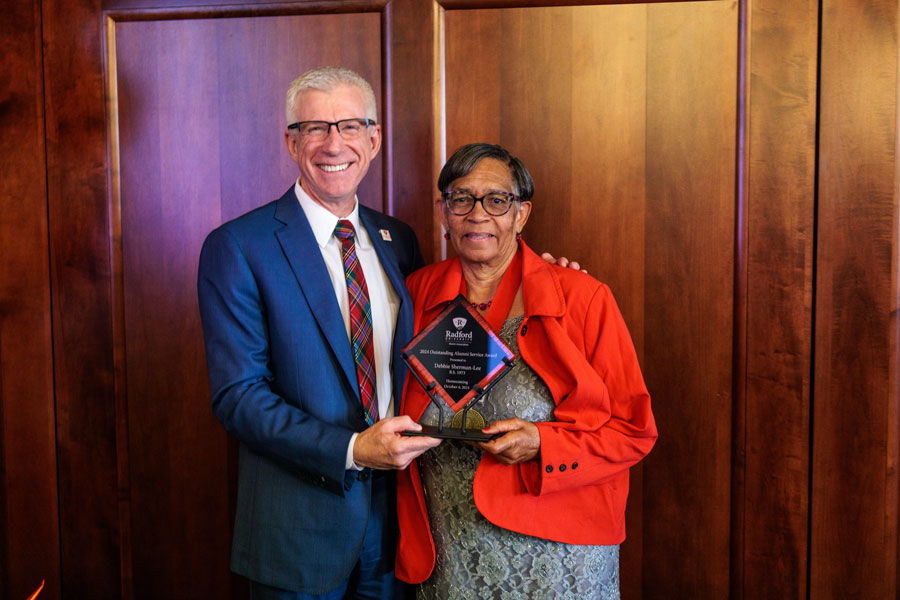 Alumni Awards recipient Debbie Sherman Lee with President Bret Danilowicz.
