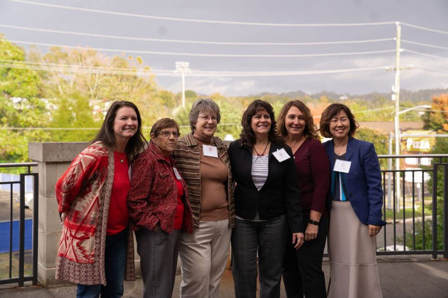 Virginia Bruggraf with friends outside the Covington Center
