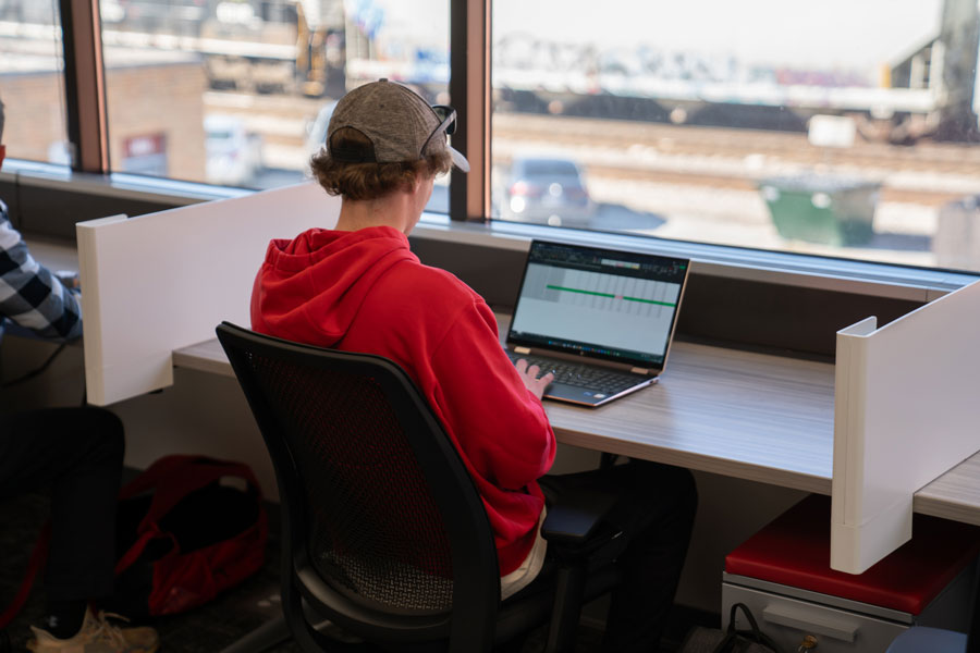 student in the hub's new CoWorking space