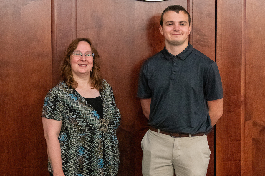 Chemistry department chair Kimberly Lane (left) and rising junior student Joshua Czorapinski (right) spoke to the Radford University Board of Visitors about the value and opportunities available in undergraduate research.