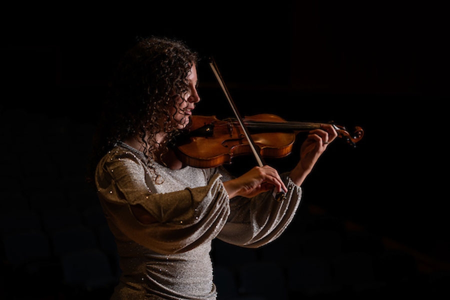 Master's student Michelle Lynn King plays the violin.