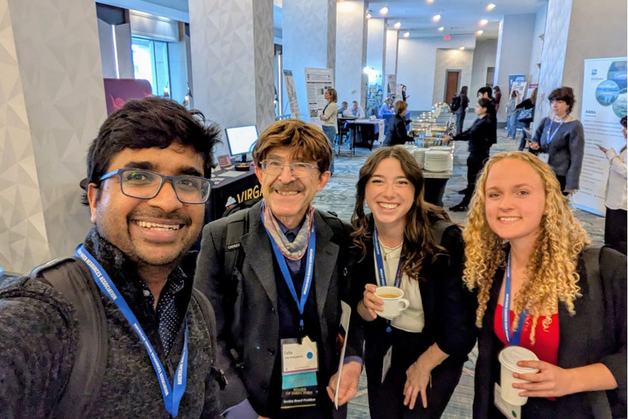 Students and faculty at a conference