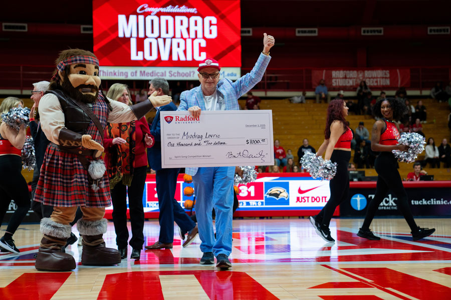 Song winner Miodrag Lovric holds the prize winnings