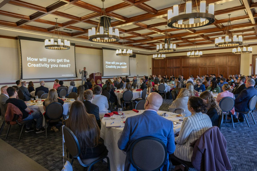 During the semi-annual entrepreneurial luncheon, held March 27 at Kyle Hall, professional artist and consultant Noah Scalin told the crowd that many companies deem creative skills essential for success. 