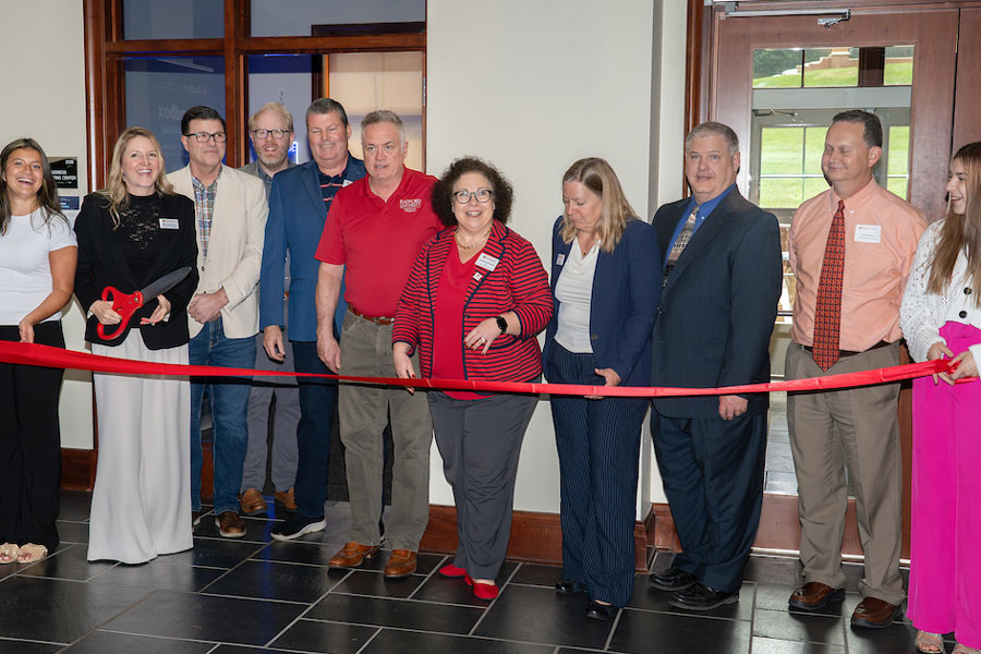 Faculty and staff attend the ribbon cutting of Radford University's new AI Sandbox.