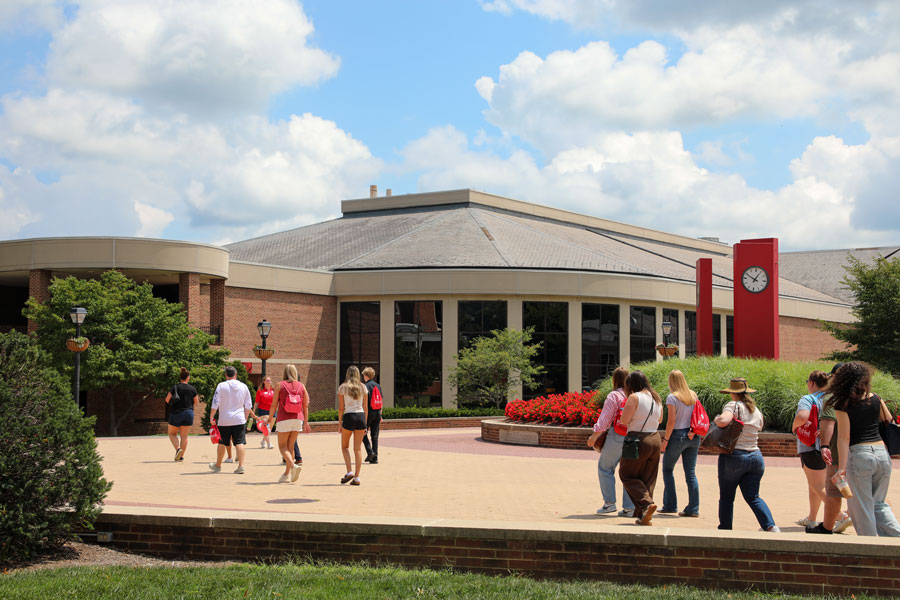 Local high school seniors and their families tour campus during their visit.